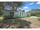 Charming single-story home with well-maintained landscaping and inviting curb appeal at 12722 Oak Tree Dr, Hudson, FL 34667