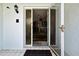 The foyer features an open view into the home, welcoming visitors with neutral tones and a glimpse of the interior at 12722 Oak Tree Dr, Hudson, FL 34667