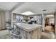 Kitchen featuring a breakfast bar, stainless steel appliances, and skylight at 12722 Oak Tree Dr, Hudson, FL 34667