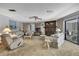 Comfortable living room showcases a stone fireplace and plush seating at 12722 Oak Tree Dr, Hudson, FL 34667