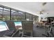 Inviting screened-in pool area with lounge chairs and exercise equipment at 12722 Oak Tree Dr, Hudson, FL 34667