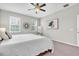 Comfortable bedroom with ceiling fan and a lot of natural light at 12854 Rangeland Blvd, Odessa, FL 33556