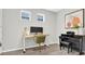 Cozy home office with a desk, chair, and piano at 12854 Rangeland Blvd, Odessa, FL 33556