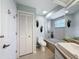 Bathroom showcasing a bathtub with a shower, a toilet, a closet and a vanity with sink at 13627 Glaze Brook Dr, Hudson, FL 34667