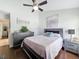 Stylish bedroom featuring a bed, contemporary furniture, and a window providing ample natural light at 13627 Glaze Brook Dr, Hudson, FL 34667