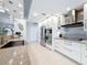 Bright kitchen with stainless steel appliances, granite countertops, and ample cabinet space at 13627 Glaze Brook Dr, Hudson, FL 34667