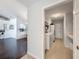 View of the laundry room area with washer, dryer, and storage at 13627 Glaze Brook Dr, Hudson, FL 34667
