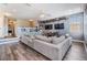 Comfortable living room with hardwood floors, recessed lighting, and a ceiling fan at 1418 Halapa Way, Trinity, FL 34655