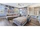 Cozy living room featuring comfortable seating, sports memorabilia and a ceiling fan at 1418 Halapa Way, Trinity, FL 34655