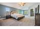 Spacious main bedroom with carpet floors and natural light at 1418 Halapa Way, Trinity, FL 34655