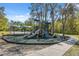 Neighborhood playground includes slides, a covered play area, and picnic tables for residents at 15413 Azra Dr, Odessa, FL 33556