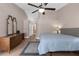 Primary bedroom featuring neutral tones and view into hall with plenty of storage at 18244 Autumn Lake Boulevard, Hudson, FL 34667