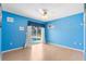 Bright bedroom with access to the pool, perfect for relaxation and enjoyment at 18242 Autumn Lake Boulevard, Hudson, FL 34667