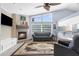 Comfortable living room with fireplace, offering a cozy and inviting atmosphere at 18244 Autumn Lake Boulevard, Hudson, FL 34667
