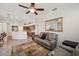 Comfortable living area featuring an open layout, a neutral color palette, and natural light at 18520 Hidden Pines Way, Hudson, FL 34667