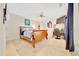 Cozy bedroom boasts a ceiling fan, neutral tones, and a spacious closet at 21000 Exeter Ct, Brooksville, FL 34601