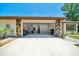 Exterior view of home's open garage leading into home's interior laundry and storage space at 21000 Exeter Ct, Brooksville, FL 34601