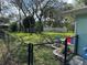 A spacious, fenced backyard provides a secure and private outdoor space at 2158 Clayton Ave, Spring Hill, FL 34609