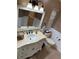 Charming bathroom featuring elegant vanity, toilet, and stylish fixtures at 2158 Clayton Ave, Spring Hill, FL 34609