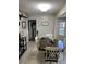 Cozy dining area with round table and seating for four, adjacent to the kitchen and laundry room at 2158 Clayton Ave, Spring Hill, FL 34609