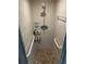 Clean shower with tiled walls, grab bars, and modern fixtures at 2158 Clayton Ave, Spring Hill, FL 34609