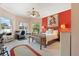 Bright bedroom with large windows, a ceiling fan, and ample natural light, offering a comfortable living space at 21820 Carson Dr, Land O Lakes, FL 34639