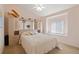 Bright room featuring a full bed and a built-in wall of storage at 21820 Carson Dr, Land O Lakes, FL 34639
