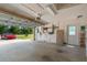 View of the spacious two car garage with garage door open at 21820 Carson Dr, Land O Lakes, FL 34639