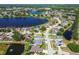 Community aerial displays multiple lakes, lush trees, and well-kept streets at 22431 Willow Lakes Dr, Lutz, FL 33549