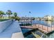 Well-maintained boat dock with a ramp and waterfront views, perfect for boating enthusiasts at 3546 Flamingo Blvd, Hernando Beach, FL 34607