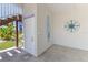 Garage entry with stairs and tropical-themed decor creates a welcoming ambiance at 3546 Flamingo Blvd, Hernando Beach, FL 34607