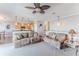 Spacious living room with comfortable seating, stylish lighting, and an open layout at 3546 Flamingo Blvd, Hernando Beach, FL 34607