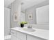 Bright bathroom featuring a large vanity, a stylish mirror, and modern fixtures providing a clean, functional space at 3767 Dragonfly Trl, Odessa, FL 33556
