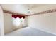 Cozy bedroom with carpet flooring, ceiling fan, and a bright window at 4048 St Ives Blvd, Spring Hill, FL 34609
