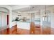 Open-concept kitchen featuring ample counter space and hardwood floors at 4048 St Ives Blvd, Spring Hill, FL 34609