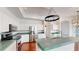 Modern kitchen featuring stainless steel appliances and ample counter space at 4048 St Ives Blvd, Spring Hill, FL 34609
