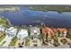 Waterfront homes featuring private boat docks and beautifully landscaped yards along the water at 4348 Harborpointe Dr, Port Richey, FL 34668