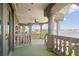 Balcony with pillars overlooking the water at 4348 Harborpointe Dr, Port Richey, FL 34668