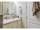 Bathroom with framed mirror, vanity with drawers, and doorway on right at 4348 Harborpointe Dr, Port Richey, FL 34668
