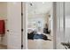 Bedroom features an ensuite bathroom and a private balcony with tropical views at 4348 Harborpointe Dr, Port Richey, FL 34668