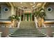 Grand entrance features a wide staircase leading to the front door with transom windows at 4348 Harborpointe Dr, Port Richey, FL 34668