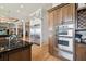 This gourmet kitchen has stainless appliances and ample cabinet space, creating a dream cooking space at 4348 Harborpointe Dr, Port Richey, FL 34668
