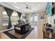 A creative home office with a custom desk, natural light, and a unique design at 4348 Harborpointe Dr, Port Richey, FL 34668
