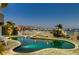Relax by the waterfront pool with city views, a spa, and elegant landscaping for the ultimate outdoor retreat at 4348 Harborpointe Dr, Port Richey, FL 34668