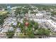 Aerial view of a neighborhood with a red pin on the home, mature trees, and streetscape at 435 11Th N Ave, St Petersburg, FL 33701