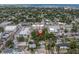 Expansive aerial cityscape highlighting tree-lined streets, houses, and distant ocean view at 435 11Th N Ave, St Petersburg, FL 33701