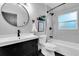 Modern bathroom with sleek black fixtures, subway tile, and ample natural light at 435 11Th N Ave, St Petersburg, FL 33701