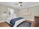Cozy bedroom with hardwood floors, tray ceilings, and modern decor at 435 11Th N Ave, St Petersburg, FL 33701