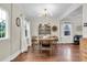 Charming dining room with hardwood floors, modern lighting, and windows for natural light at 435 11Th N Ave, St Petersburg, FL 33701