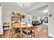 Dining room leading into living room with hardwood floors and ample natural light at 435 11Th N Ave, St Petersburg, FL 33701